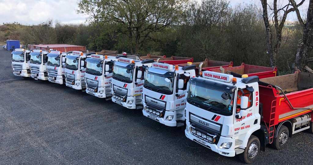 Line of MOH haulage trucks